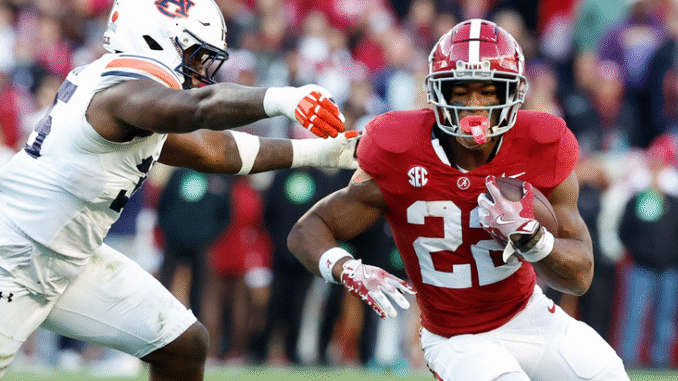SEC football rivalry Alabama vs Auburn player exchange concept